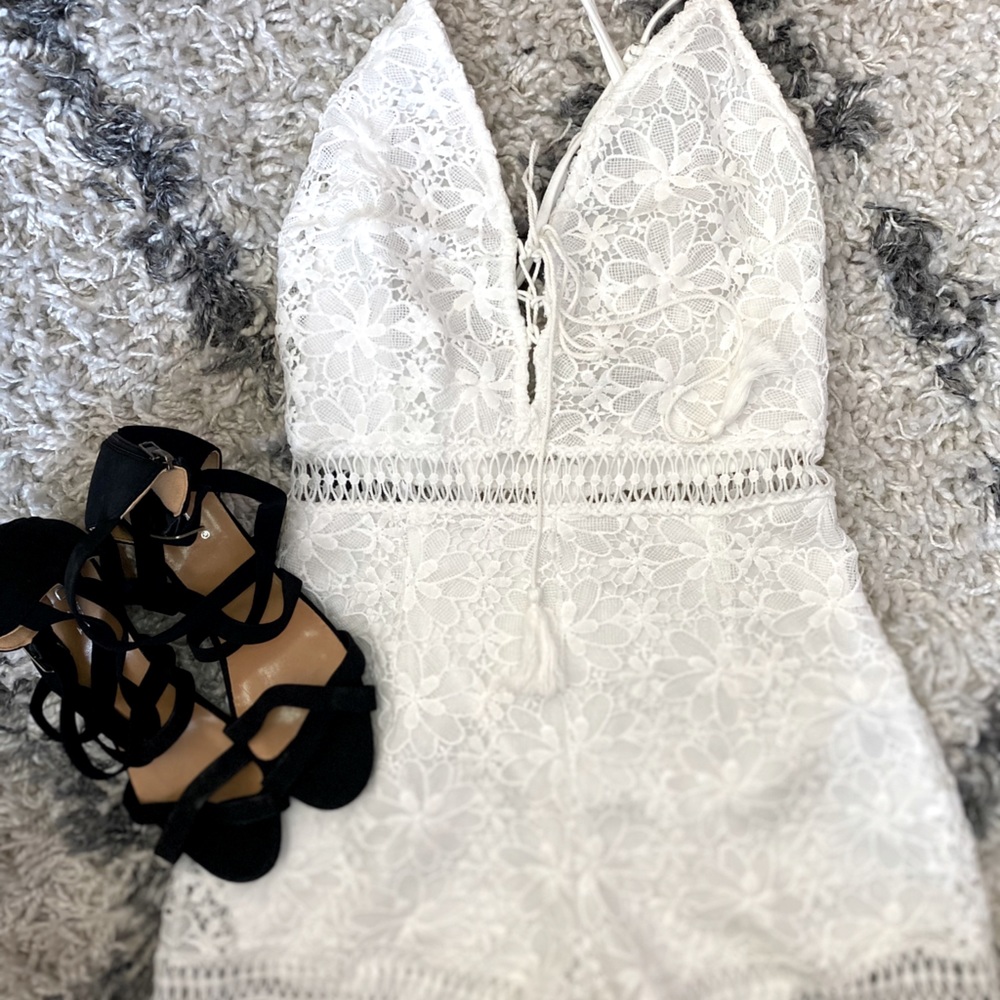 Cute white romper with detail